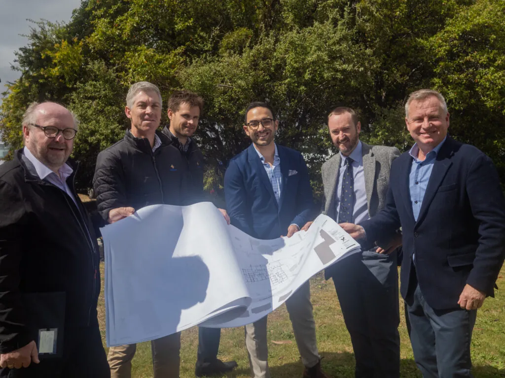 Deputy Secretary Community, Mental Health and Wellbeing Dale Webster; Fairbrother General Manager Southern Tasmania, Paul Ransley; Fairbrother Manager - Construction, Southern Tasmania, Phil De Jong, Liberal Member for Clark, Simon Behrakis, Deputy Secretary Infrastructure, Andrew Hargrave, and Premier Jeremy Rockliff examine the plans for the new Mental Health Precinct to be constructed in New Town, Tasmania.