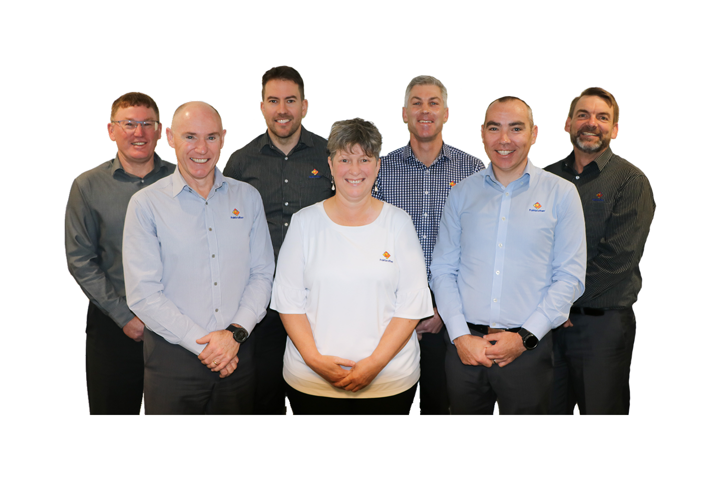 A group photo of the smiling Fairbrother Executive team wearing the corporate uniform.